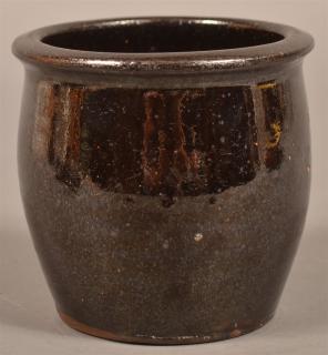 Appraisal: Manganese Glazed Redware Storage Crock Stamped on base C Link