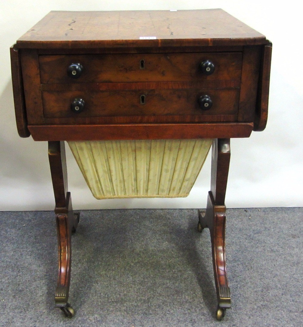 Appraisal: A Regency figured yew drop flap work table with a