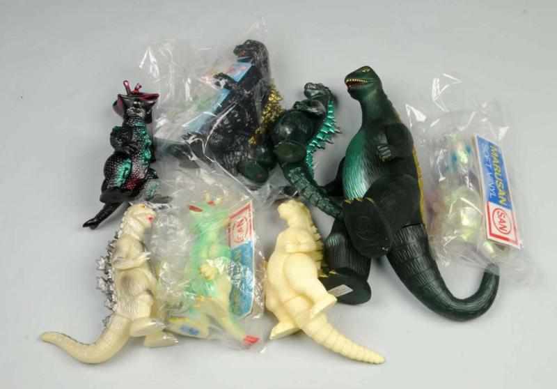 Appraisal: Lot of Godzilla Soft Vinyl Figures Description Includes one Giant