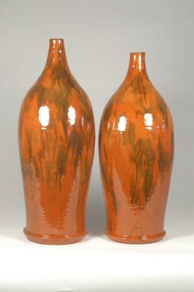 Appraisal: Unsigned att Joe Owen Pair of lead glazed lamp bases