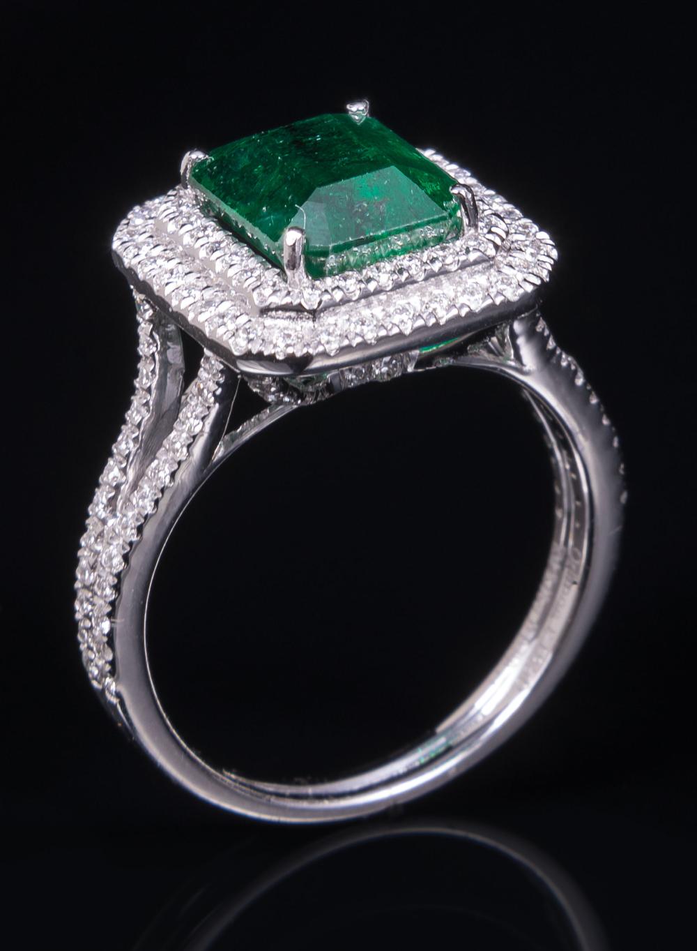 Appraisal: Platinum Emerald and Diamond Ring center prong set octagonal step