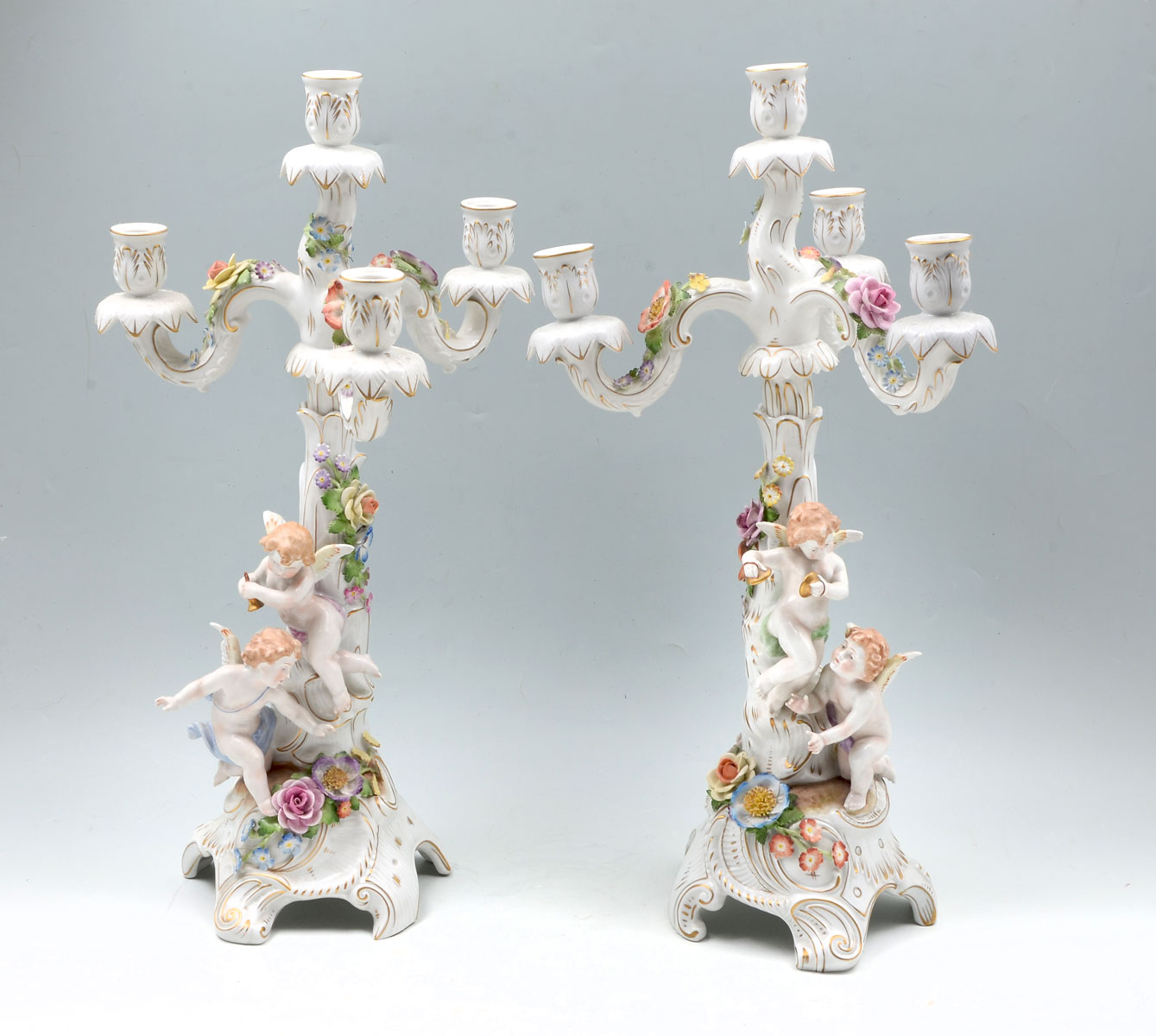 Appraisal: PAIR OF GERMAN SCHIERHOLZ FIGURAL PORCELAIN CANDLESTICKS German Schierholz porcelain