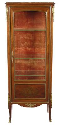 Appraisal: A French mahogany and brass vitrine the marble top to