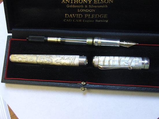 Appraisal: A SILVER FOUNTAIN PEN decorated with the leopard's head and