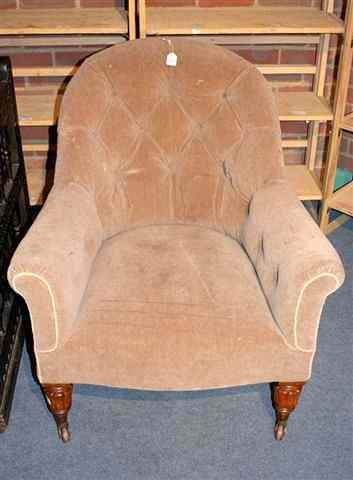 Appraisal: A WILLIAM IV EASY CHAIR on reeded forelegs upholstered in