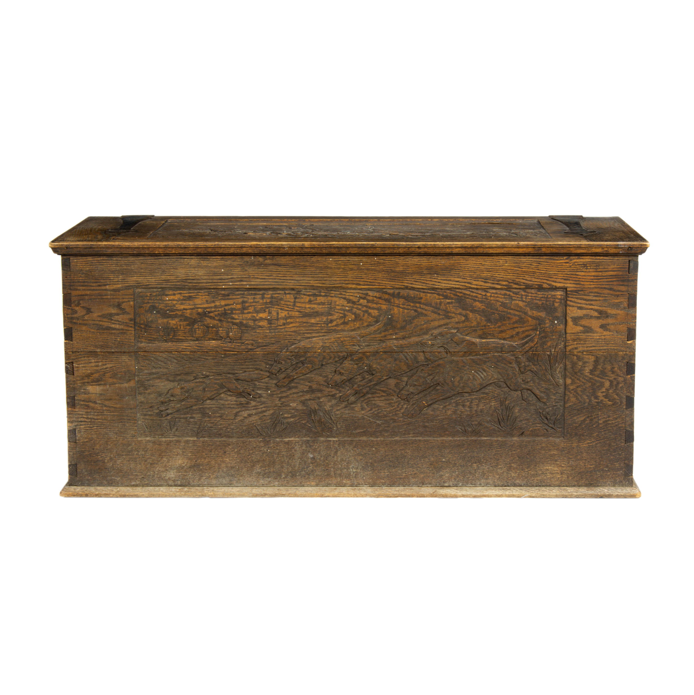 Appraisal: AN ARTS CRAFTS CARVED OAK BLANKET CHEST IN THE WESTERN