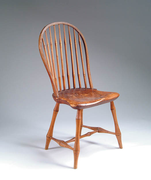 Appraisal: ANTIQUE BOWBACK WINDSOR SIDE CHAIR Well turned bamboo style splay