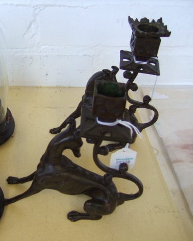 Appraisal: A pair of French novelty bronze dog candlesticks th century