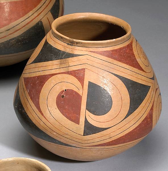 Appraisal: A Casas Grandes polychrome jar With three repeated diamond configurations