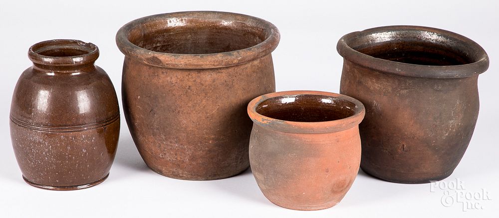 Appraisal: Four redware crocks th c Four redware crocks th c