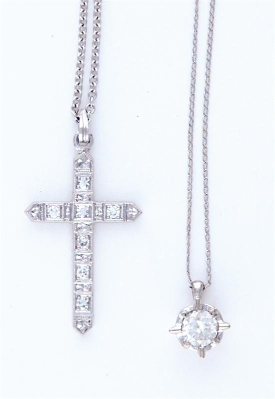 Appraisal: Diamond pendant and cross pendant set with round brilliant-cut diamond