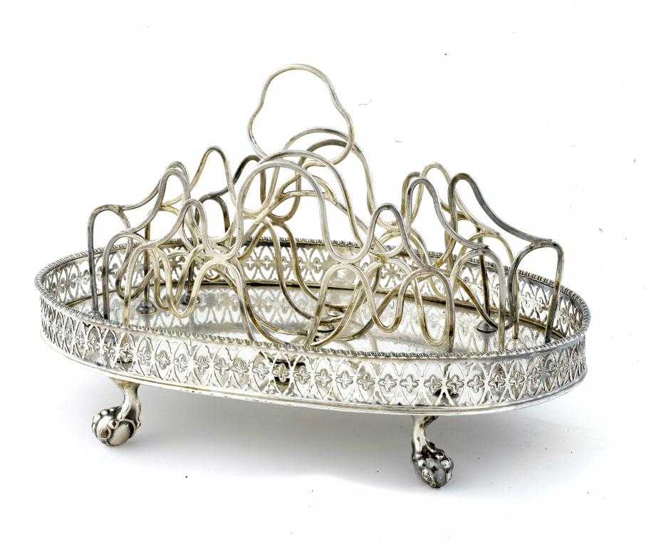 Appraisal: AN OLD SHEFFIELD PLATE TOAST RACK with wirework divisions the