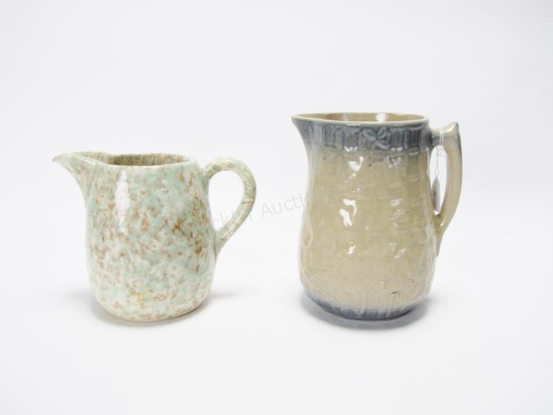 Appraisal: Two Art Pottery Pitchers including green and brown spongeware with