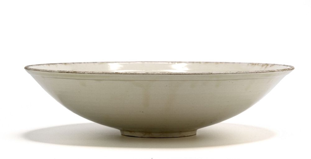 Appraisal: Fine Large Ting Ware Carved Bowl Finely potted with rounded