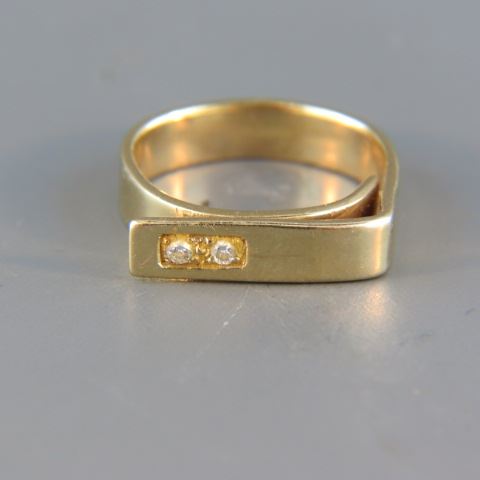 Appraisal: Diamond Ring two small diamonds in designer style yellow gold