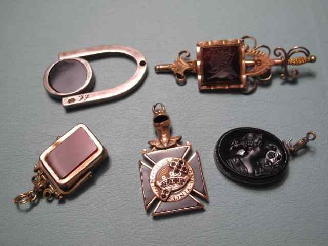 Appraisal: Lot of assorted Intaglio pendants etc Includes a silver black