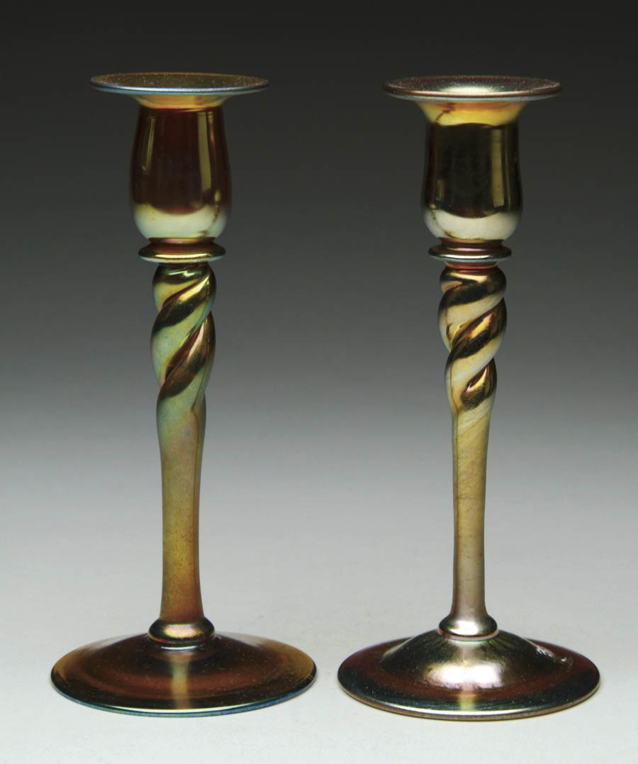 Appraisal: PAIR OF STEUBEN CANDLESTICKS Gold aurene coloring with a twist