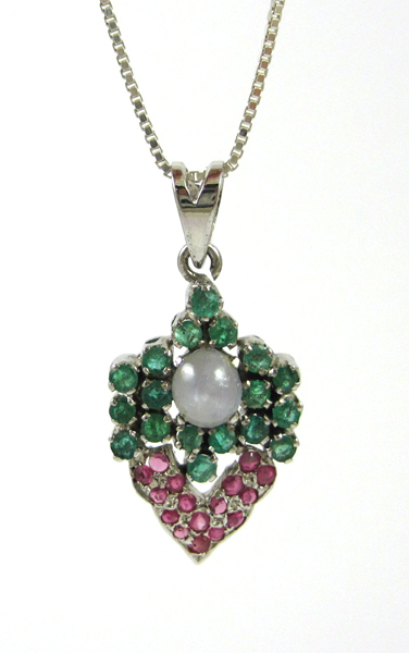 Appraisal: STAR SAPPHIRE RUBY AND EMERALD PENDANT NECKLACE suspended on a