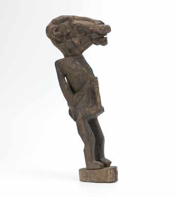 Appraisal: A Carved Protective Figure Lombok Indonesia Carved wood figure with