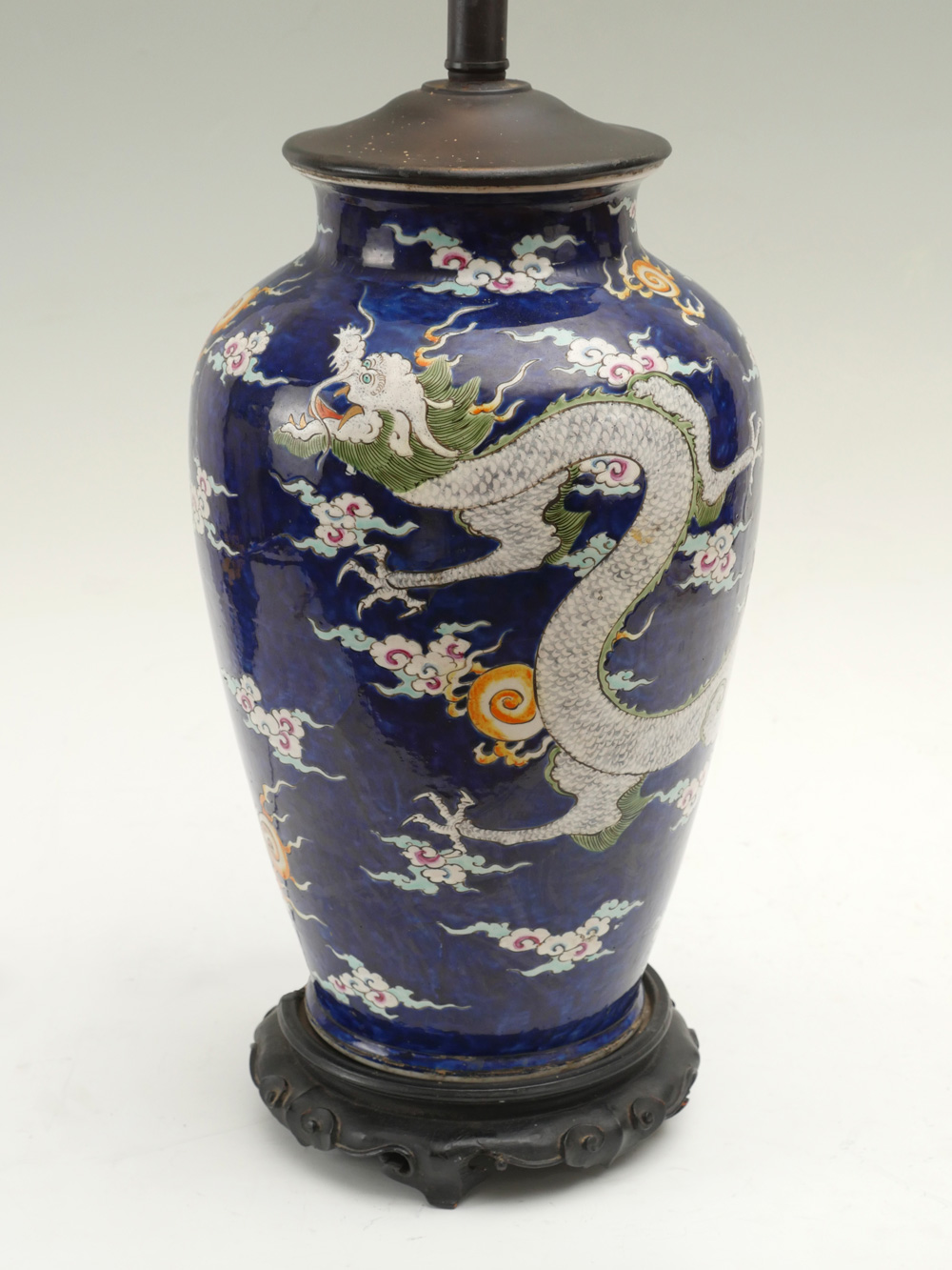 Appraisal: LARGE BLUE GLAZE ASIAN DRAGON LAMP Blue glazed vase lamp