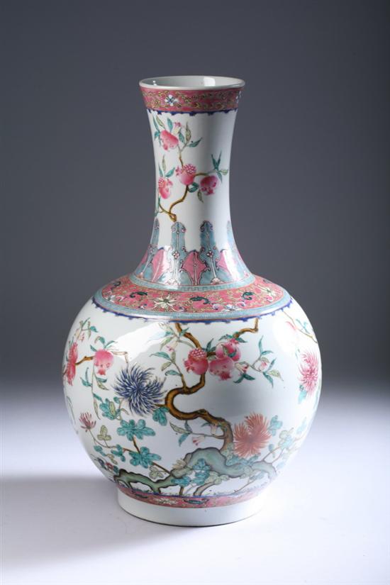 Appraisal: CHINESE FAMILLE ROSE PORCELAIN VASE th century Xuantong six-character iron