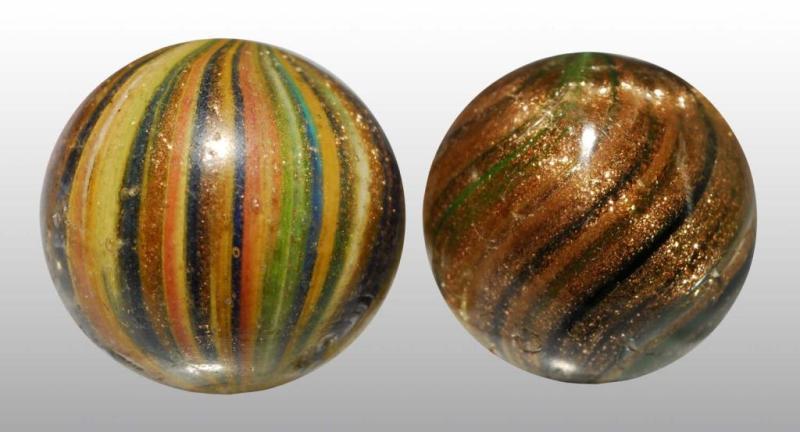 Appraisal: Lot of Lutz Marbles Description One onionskin lutz and one