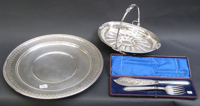 Appraisal: FOUR PIECES SILVER PLATED TABLE ACCESSORIES Including a two-piece fish