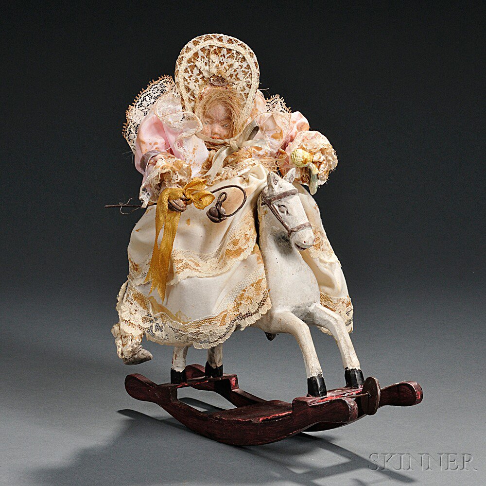 Appraisal: Musical Automaton Rocking Horse Doll the white and pink lace