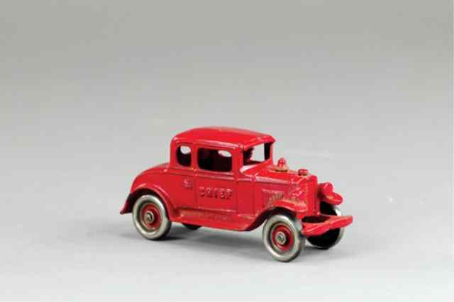 Appraisal: KENTON FIRE CHIEF COUPE WITH CAST DRIVER Painted in red