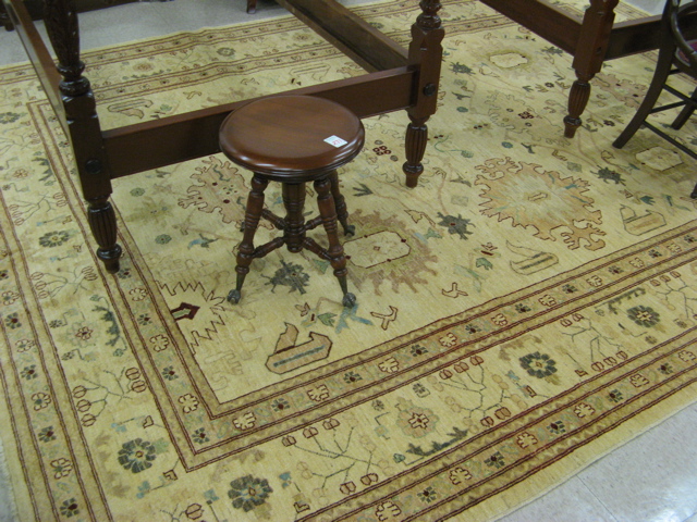 Appraisal: HAND KNOTTED ORIENTAL CARPET Pakistani Zeigler overall stylized floral decorated