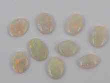 Appraisal: A quantity of loose polished opals approx carats