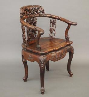 Appraisal: Chinese rosewood horseshoe chair A late th century Chinese Export