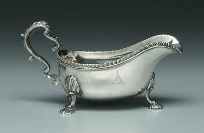 Appraisal: George II English silver sauceboat oval with gadroon border scroll