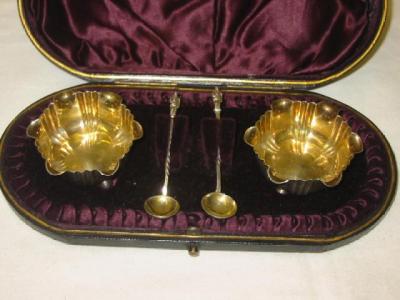 Appraisal: A PAIR OF VICTORIAN SALTS of frilled lobed circular form