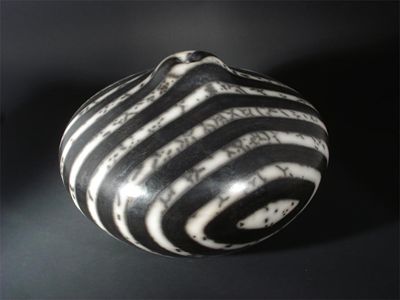 Appraisal: A Tim Andrews raku fired Gourd Humbug vase impressed seal