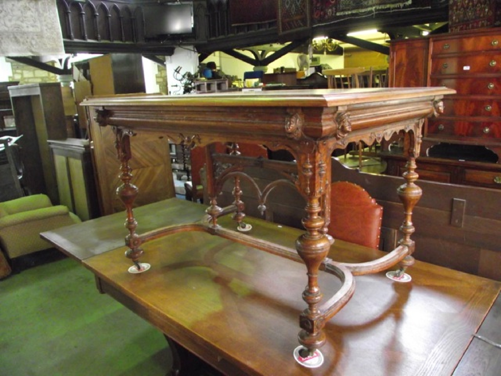 Appraisal: A large th century continental walnut pull-out extending dining table