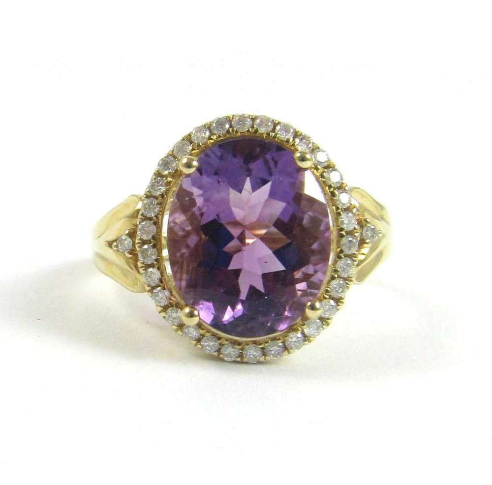 Appraisal: AMETHYST DIAMOND AND FOURTEEN KARAT GOLD RING with a diamond