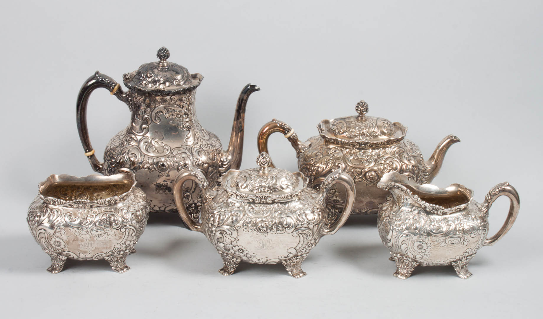 Appraisal: Sterling silver repousse tea coffee service Fuchs Beiderhase NY -