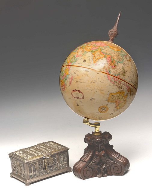 Appraisal: A MODERN TERRESTRIAL GLOBE on a carved wooden stand cm