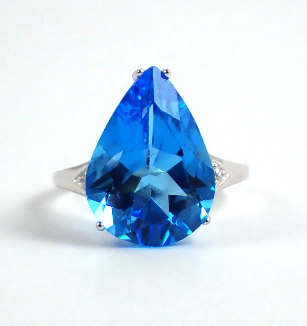 Appraisal: BLUE TOPAZ DIAMOND AND FOURTEEN KARAT WHITE GOLD RING with