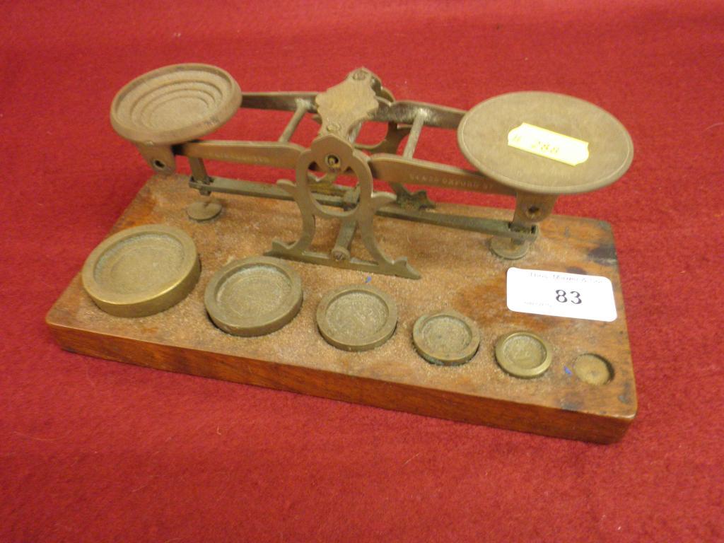 Appraisal: A set of Victorian brass and mahogany postal scales