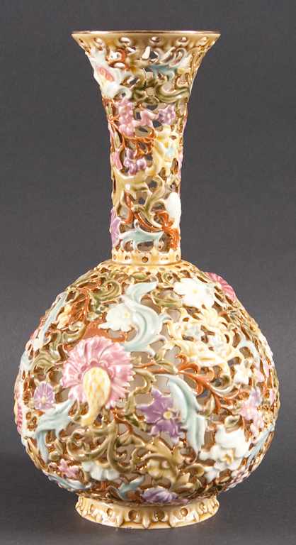 Appraisal: Zsolnay floral molded and painted parcel-gilt reticulated ceramic vase early