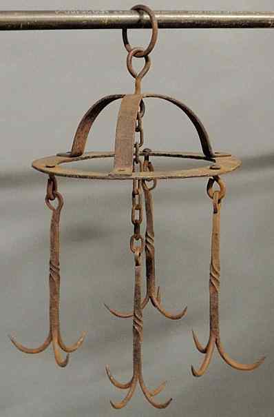 Appraisal: Wrought iron hanging crown hooks th c for a spit