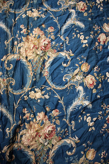 Appraisal: A PAIR OF FRENCH BLUE GROUND CURTAINS decorated with acanthus