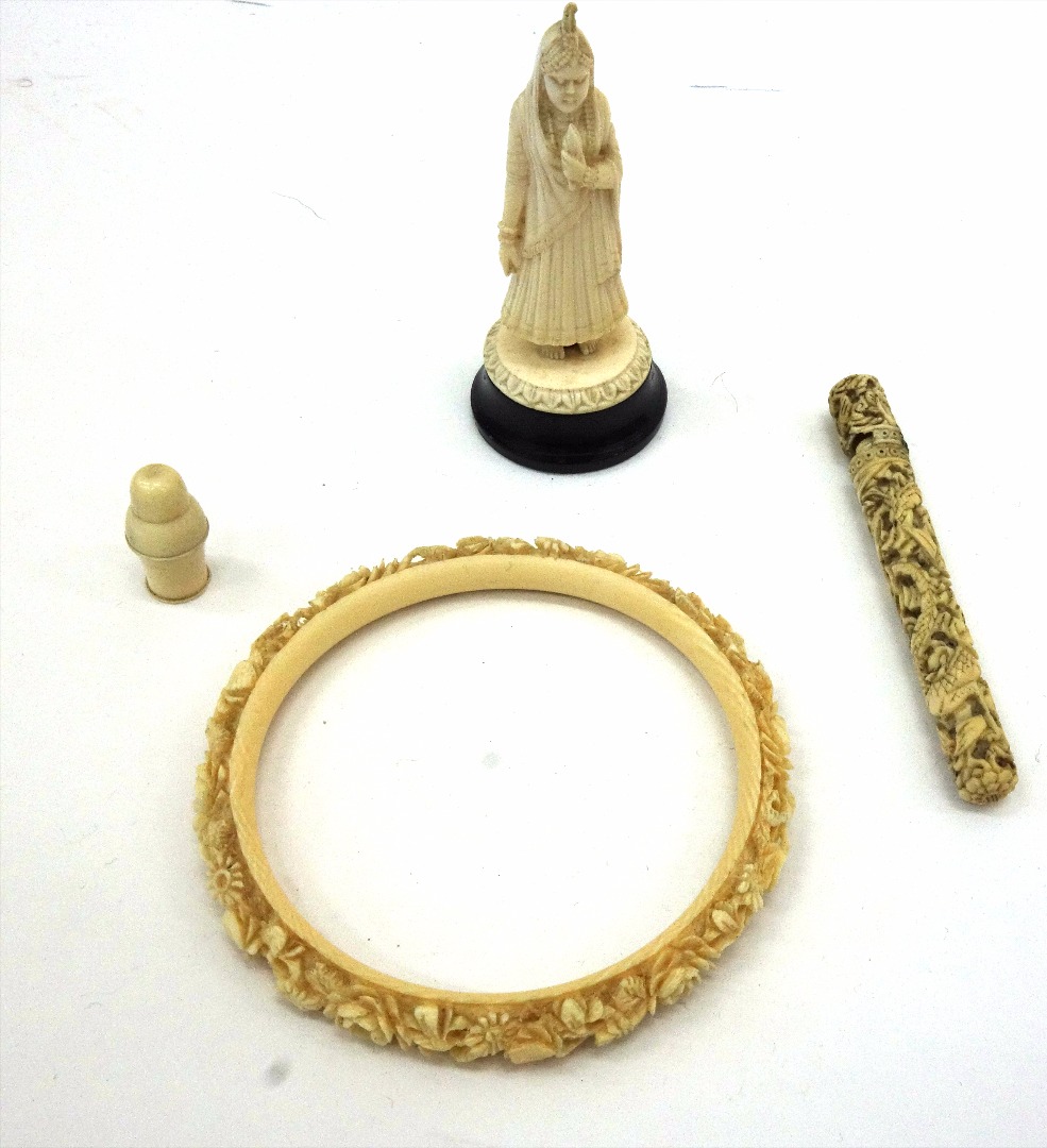 Appraisal: A Canton cylindrical carved ivory needle case Qing dynasty th