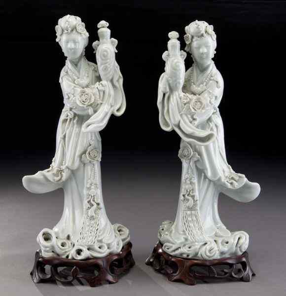 Appraisal: Pr Chinese Qing blanc de chine porcelain ladieseach holding a