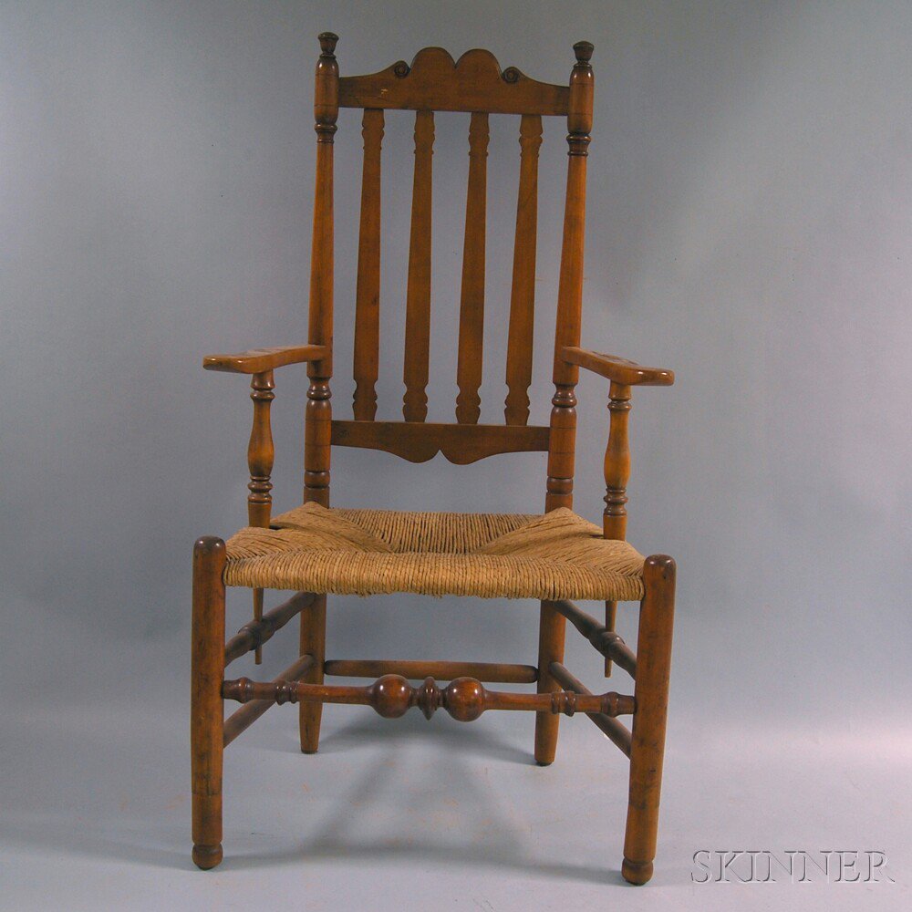 Appraisal: Country Carved Maple Banister-back Armchair th century the double-arch cresting