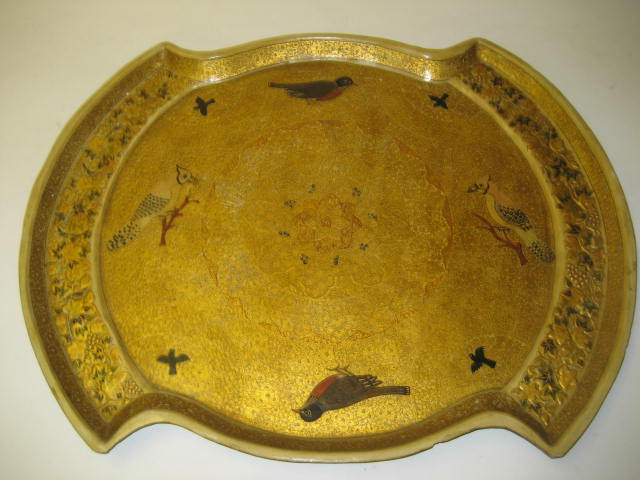 Appraisal: A PERSIAN LACQUERED TRAY of shaped quatrefoil form the gilt