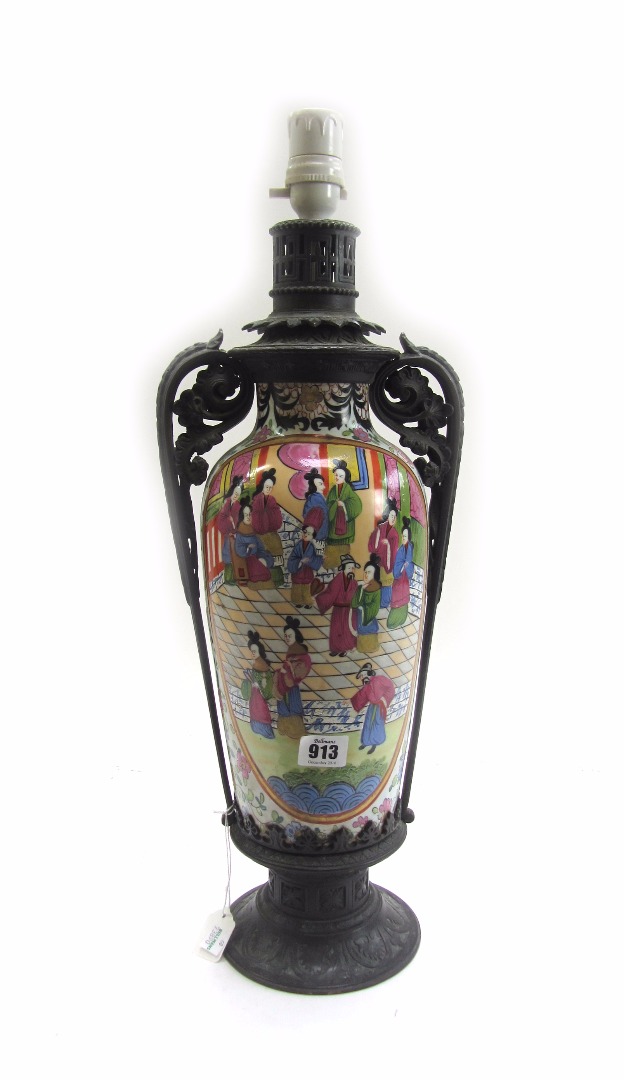 Appraisal: A Chinese vase with reserves painted with palace scenes now