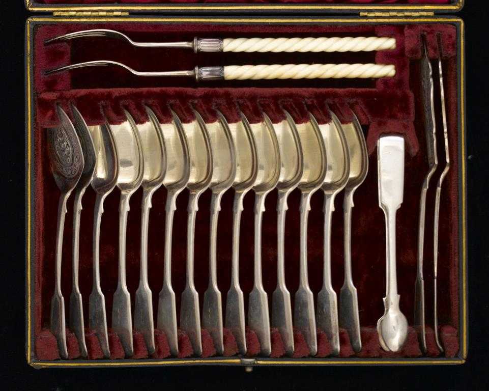 Appraisal: A VICTORIAN TABLE SERVICE comprising twelve teaspoons pair of jam